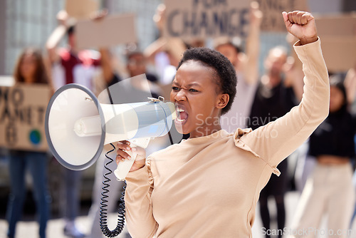 Image of Equality, protest and black woman leader with megaphone and shouting loud for justice due to government problem. Justice, angry and person fist up for politics fight or freedom with frustrated group