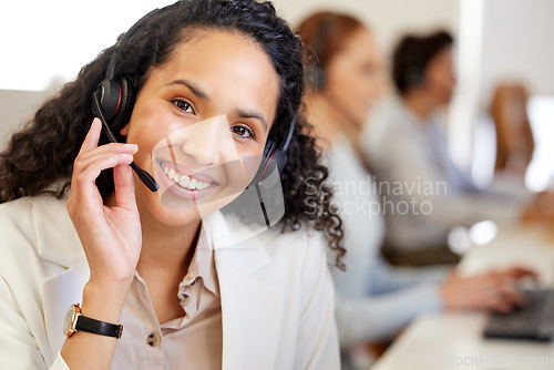 Image of Business woman, call center and portrait with a smile of phone consultation and web support. Consulting, happiness and office of a customer service, contact us and telemarketing employee at company