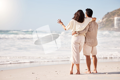 Image of Couple hug on beach, sea and back view with trust, travel and vacation in Mexico with love and bonding outdoor. Mockup space, summer and people together in nature with relationship and commitment