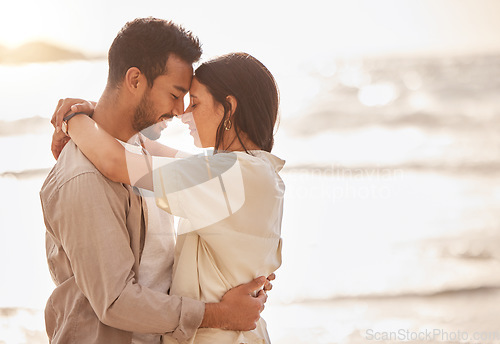 Image of Couple hug at beach, forehead touch and travel with sun and sea, love and care with vacation in Mexico. Commitment, support and trust in relationship, tourism and people embrace with mockup space