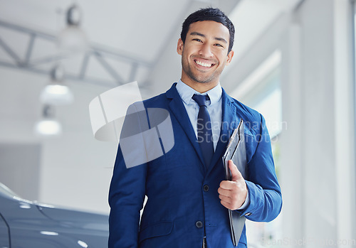 Image of Portrait, documents and car salesman smile at dealership, workshop or workplace. Face, folder and male person at showroom for motor vehicle shopping, business owner or sales manager in retail store.