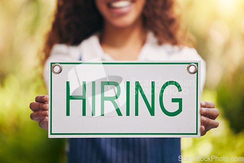 Image of Hands, smile and woman with hiring sign for employment, career or job opportunity. Recruitment, poster and African female business owner, florist and advertising interview, hire or hr onboarding.