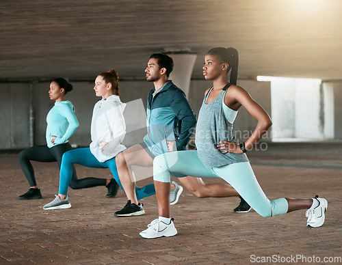 Image of Team, training and people stretching as a fitness club for sports, health and wellness in an urban class together. Sport, commitment and friends exercise or team doing pilates workout in yoga