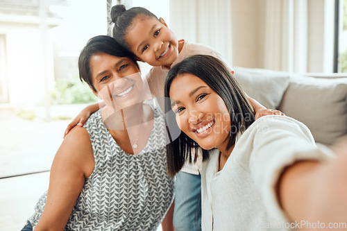 Image of Happy family, portrait smile and selfie for social media, profile picture or online post on living room sofa at home. Grandma, mother and child smiling for photo, memory or bonding together in house