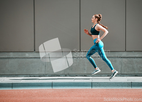 Image of Young woman, urban running and city sidewalk with training, exercise and fitness on road. Street, runner profile and female athlete with mockup and body workout for health, wellness and race outdoor