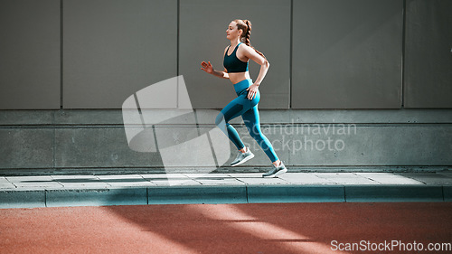 Image of Young woman, sport running and city sidewalk with training, exercise and fitness on urban road. Street, runner profile and female athlete with mockup and workout for health, wellness and race outdoor