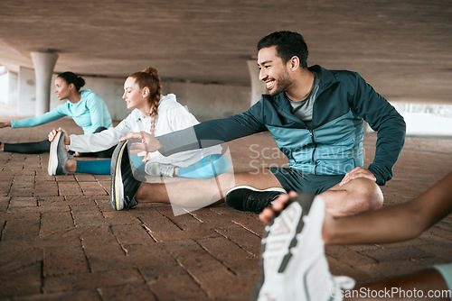 Image of Group, workout and people stretching as a fitness club for sports, health and wellness in an urban town together. Sport, smile and happy friends training or team doing warm up exercise in a city