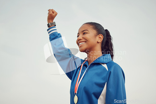 Image of Happy woman, fist and celebration in sports for winning success or victory achievement on mockup. Female person, athlete or winner with smile in joy for win, award or sport medal on mock up space