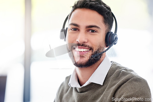 Image of Man, portrait and happy call center worker with headset, smile and professional mindset for customer service, support or help. Face, person and working in telemarketing, crm or online consulting