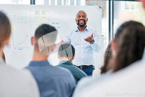 Image of Business, coach and presentation with employees for a seminar with explanation and smile. Speaker, professional and corporate team for training or learning at a meeting with audience for discussion.