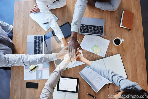 Image of Hands in stack, teamwork or top view of business people in collaboration for mission goals in company. Partnership, diversity or employees in meeting with strategy, motivation or support in office