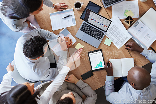 Image of Research, planning and teamwork with business people in meeting from above for data, chart and strategy. Project management, budget and report with employees in office for finance, graph and laptop