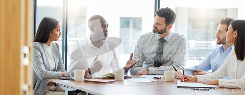 Image of Collaboration, teamwork or business people in meeting for project management or speaking of a strategy. Black man, corporate or employees talking in discussion with our vision for growth in office