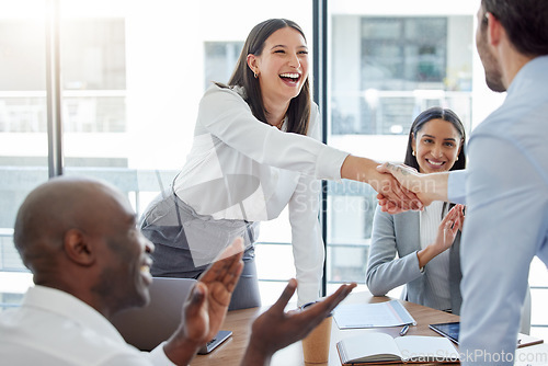 Image of Professional, introduction and shaking hands at the office during a meeting with applause. Business person, welcome and congratulation for a collaboration in the workplace for hiring and teamwork.