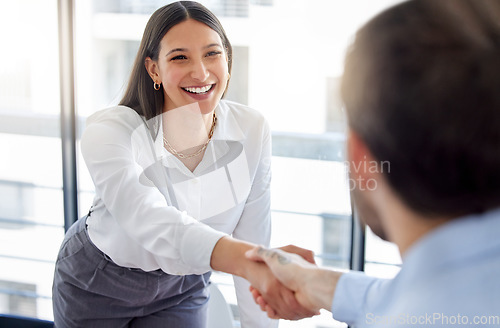 Image of Female professional, welcome and shaking hands during a meeting at a company for collaboration. Business, woman and introduction at the office have a deal or an agreement for working with employer.