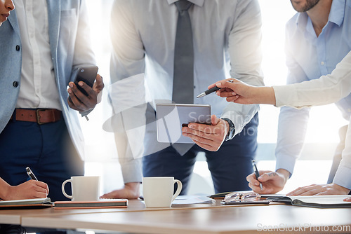 Image of Closeup, business people and staff brainstorming, teamwork or digital planning for website launch. Group, coworkers or team with technology, online reading or search internet for information or ideas