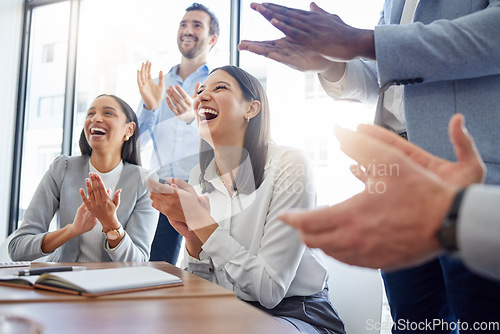 Image of Motivation, audience with an applause and in a business meeting at work with a lens flare together. Support or celebration, success and colleagues clapping hands for good news or achievement