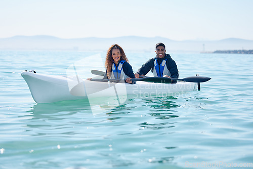 Image of Couple, kayak and rowing boat on lake, ocean or river for water sports and fitness challenge. Portrait of man and woman with smile for adventure, exercise or travel in nature for freedom and teamwork