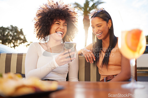 Image of Funny, women and friends with drinks, phone and laughing with happiness, relax and social media. Female people, customers and girls with a smartphone, humor and connection with cocktails and chatting