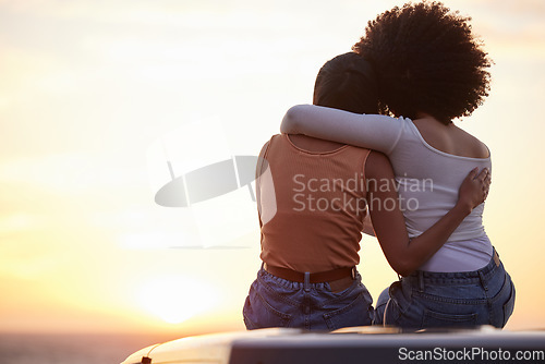 Image of Love, hug and sunset with lesbian couple at beach for relax, romance and sky mockup space. Lgbtq, freedom and pride with women hugging on nature date for partner, trust and summer vacation