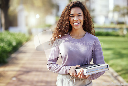 Image of Portrait, woman with books and student in campus garden, university and education with learning material for studying. Female person outdoor, academic scholarship and mockup space and college course