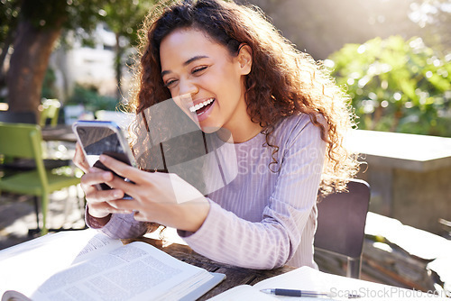 Image of Phone, study and happy woman at cafe, outdoor campus or college on social media, education and language books. Gen z, park and young african person typing, search or chat on mobile in remote learning