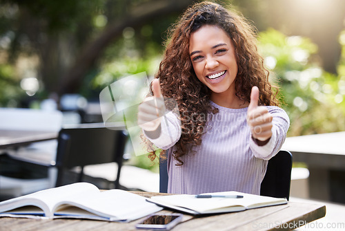 Image of Thumbs up, studying and portrait of woman at outdoor campus, happy remote work or education books. Study, college and face of student or african person like, yes and thanks or success sign and hands