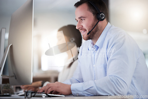 Image of Call center, consulting and computer with business man in office for communication, customer service or help desk. Telemarketing, sales and advice with employee for commitment, contact us and hotline