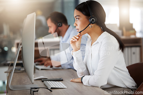 Image of Call center, consulting and computer with business woman in office for communication, customer service and help desk. Telemarketing, sales and advice with employee for focus, contact us and hotline