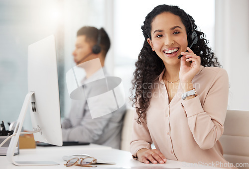 Image of Woman, portrait and call center agent working on computer in an office, startup or telemarketing company. Happy, person and job in customer service, support or consulting work, crm or communication
