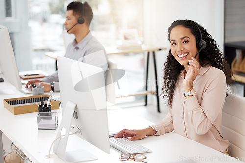 Image of Portrait, customer service and computer with a woman consultant working in her office for support or assistance. Call center, contact us or crm with a happy female employee consulting using a headset