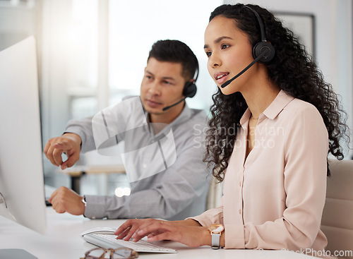 Image of Business people, call center and coaching on computer in customer service, support or telemarketing at office. Businessman training staff or woman in contact us, marketing or telesales at workplace