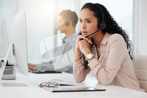 Image of Business woman, call center and frustrated in burnout, stress or customer service at office. Annoyed and tired female person, consultant or agent talking to difficult client or complaint at workplace