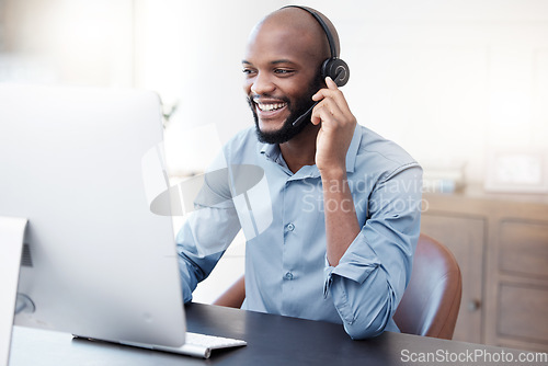 Image of Black man, callcenter with phone call and computer, contact us with communication, headset and technology. Male consultant, CRM with customer service and tech support with help desk worker and smile