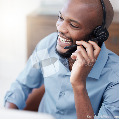 Image of Black man, call center and happy agent working on computer in the office, business in telemarketing or customer service. Businessman, face with smile and crm, conversation with client on help desk