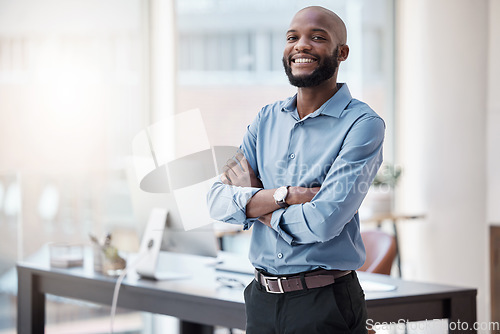 Image of Black man in business, arms crossed and smile in portrait with confidence, mockup space and professional mindset. Career mission, ambition and empowered happy male employee in corporate workplace