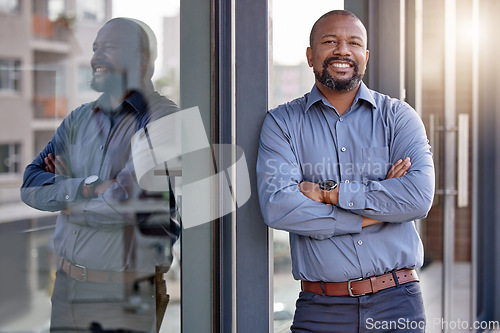 Image of Happy, portrait of black businessman with arms crossed and at office building outside with a lens flare. Happiness, good news and confident or cheerful African male person outdoors of workplace