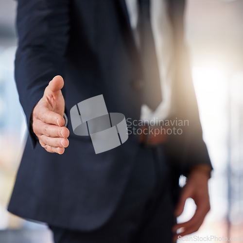 Image of Businessman, handshake and deal in meeting for hiring, partnership or b2b agreement at the office. Man employee shaking hands for business welcome, recruiting or introduction to job at the workplace