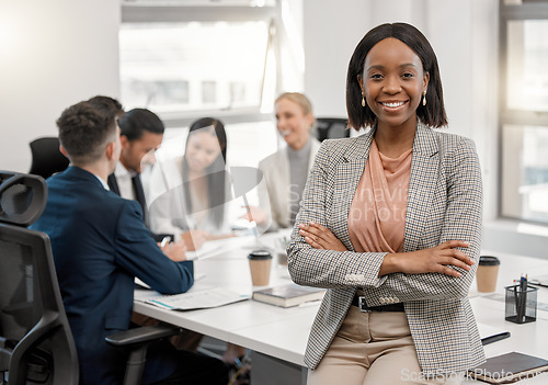 Image of Portrait, black woman and lawyer with arms crossed for business, leadership and office meeting. Face, confidence and happy African female entrepreneur, professional and attorney with success mindset