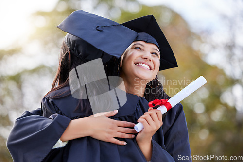 Image of Graduation, education and woman friends hugging at a university event on campus for celebration. Graduate, certificate and hug with female students together in support of a scholarship achievement