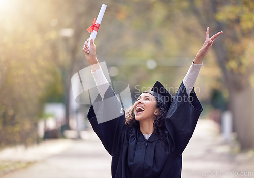 Image of Success, college student graduate and celebration outdoors with a lens flare. Victory or education, university and happy woman cheering for achievement on her graduation day with certificate