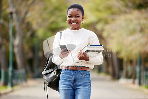 Image of Portrait, phone and books with a student black woman on her commute to university campus for education. Mobile, social media and contact with a female college pupil checking for her next lecture