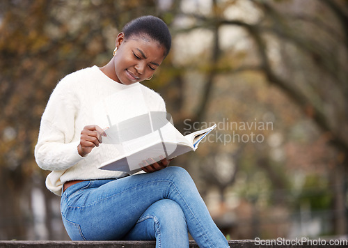 Image of Woman, reading and notebook in the outdoor at university for knowledge and research at school. Female student, book and learning at the park for an education with a scholarship for motivation.