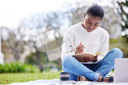 Image of Female student, laptop and writing in notebook at park for college with knowledge in a close up. Woman, studying and book with tech in the outdoor for an education at university with learning.