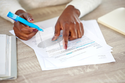 Image of Closeup, hands and black woman with documents, notes and lawyer checking contract, highlight and reading. Zoom, female person or employee with paperwork, learning and agreement with deal and feedback