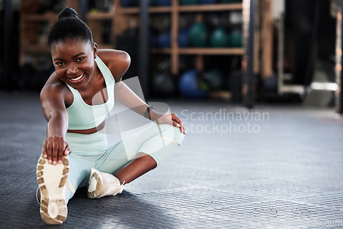 Image of Fitness, portrait or girl stretching legs for gym workout routine or body movement for wellness. Happy, athlete or healthy black woman smiling in exercise training warm up for flexibility or mobility