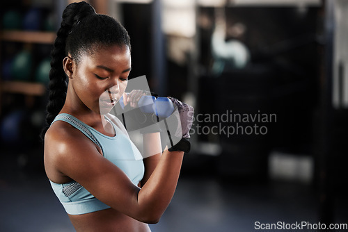 Image of Fitness, dumbbell or strong black woman training, exercise or workout for powerful arms or muscles. Wellness, healthy or African girl lifting dumbbells, weights or exercising biceps in gym studio