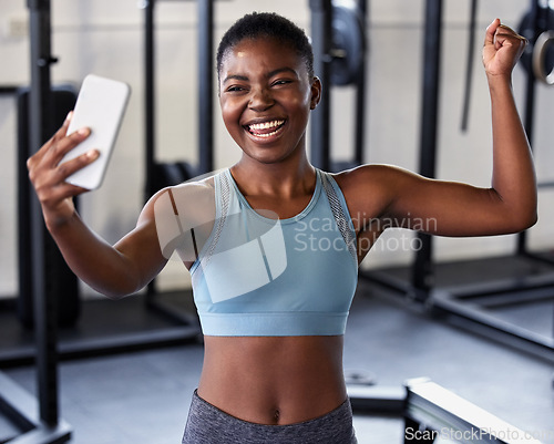 Image of Gym, flexing or happy girl taking selfie on workout, exercise or training break on social media for results. Proud influencer, strong or black woman smiling for pictures or online fitness content