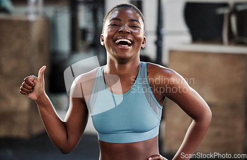 Image of Gym, portrait or happy girl with thumbs up in fitness training with positive mindset or motivation. Encouragement, workout or excited African personal trainer with like hand sign, support or thumb up