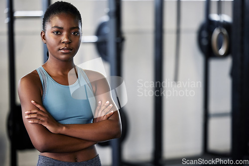 Image of Fitness, portrait or black woman at gym with arms crossed ready for a workout, exercise or training for health. Face of sports girl or serious athlete with strong mindset, resilience or confidence